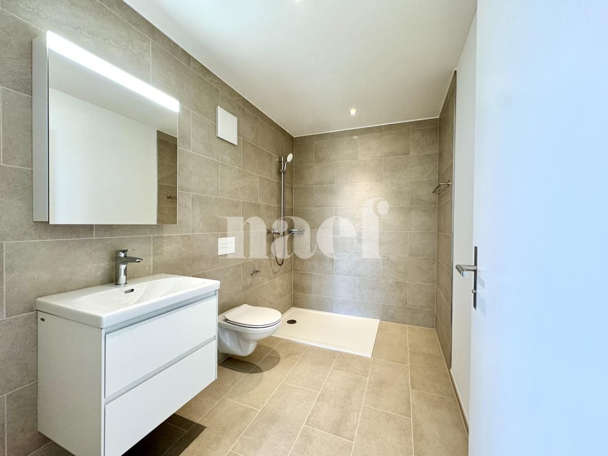 À louer : Appartement 3.5 Pieces Gampelen - Ref : 219790.1003 | Naef Immobilier