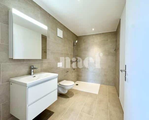 À louer : Appartement 3.5 Pieces Gampelen - Ref : 219790.1003 | Naef Immobilier